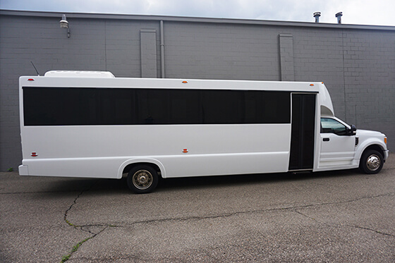 34 passengers limo bus